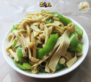 The peppers and the white mushrooms are fried
