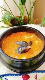 Spicy cabbage seafood tofu soup