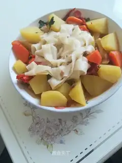 Big plate of chicken noodles