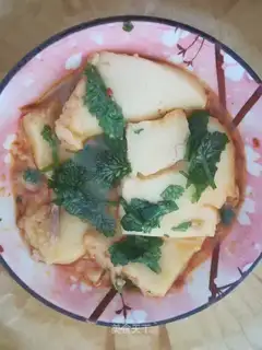 A lamb soup stew with a tofu