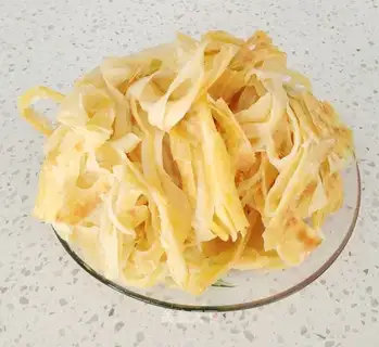 A hand torn oil cake