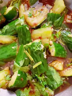 Hands on the cucumber