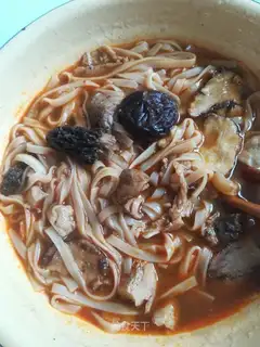 Chicken soup, mushrooms hanging