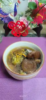 Chicken soup for mushrooms and grass