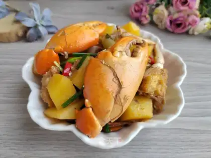 Crab burning potatoes