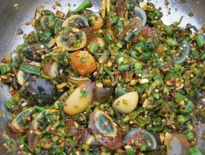 Dried duck egg mixed with chili seeds