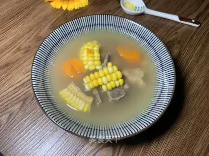 Five fingers of a peach cow with a big puddle soup
