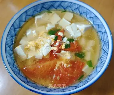 Tomato egg tofu soup