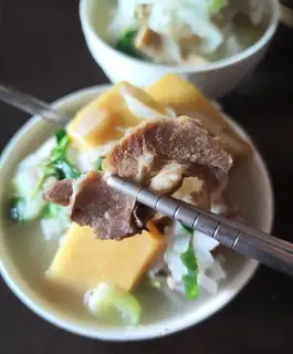 Yellow rice and goat broccoli soup