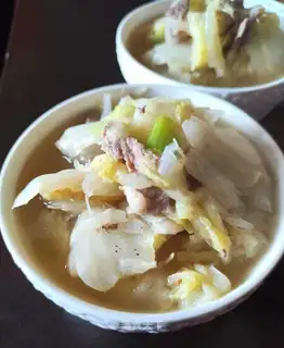 The hand tore up the cabbage