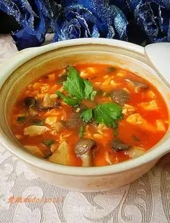 Bean curd and mushroom casserole in tomato sauce