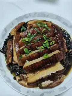 A taco with a plum chow