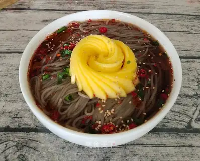 Homemade mango roses on cold side