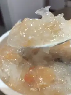 A silver spoon of grapefruit