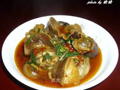 Sauteed snails in soy sauce