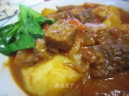 Stewed beef brisket with tomatoes and potatoes