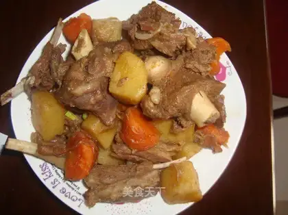 Stewed mutton with potatoes and carrots
