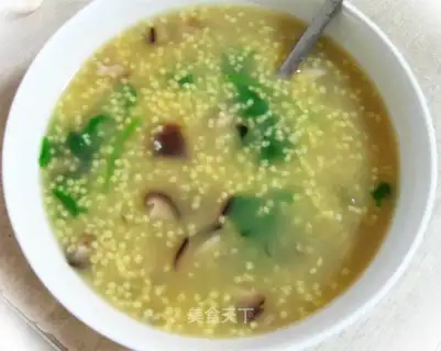 Mushroom preserved egg millet porridge