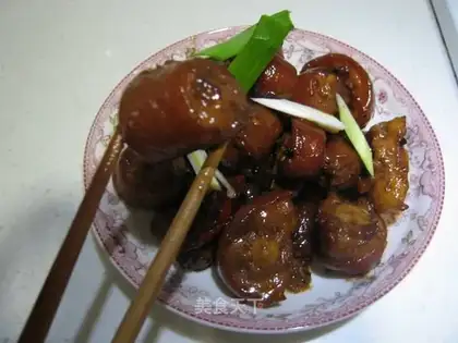 Braised pork tail