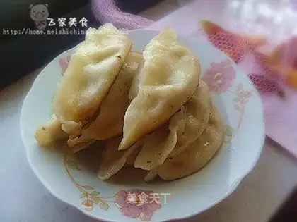 Pork and green onion stuffed pot stickers