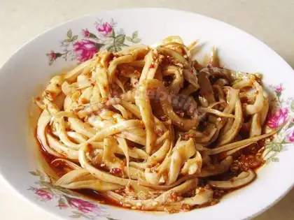Shredded abalone and mushroom with garlic