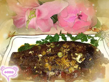 Home-cooked stewed fish with partial mouth