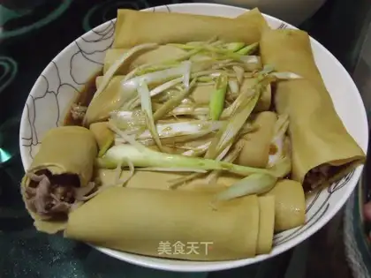 Steamed beef roll with golden mushroom and sesame sauce