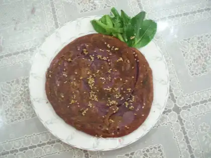Chives and sesame seeds and purple potato cakes