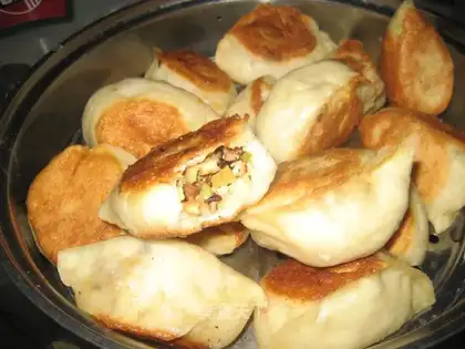 Fried buns with mushrooms and eggs