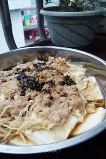 Steamed tofu with minced pork and mushroom mushrooms