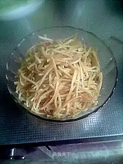 Shredded potatoes with onions