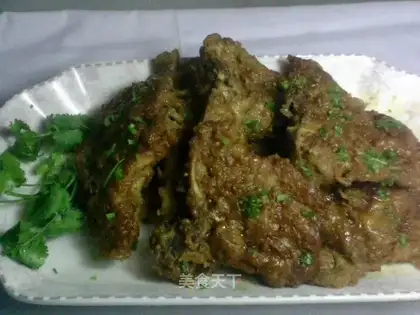Grilled steak with green onions