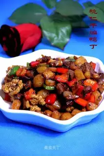 stir-fried diced duck with dried peach kernels