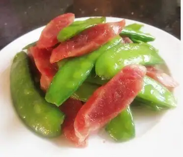 fried sausage with peas