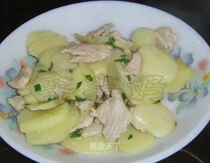 Fried pork slices with potato