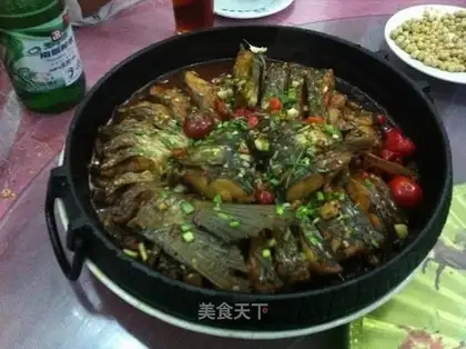 Braised fish on sizzling plate