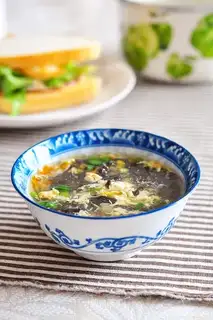 Pumpkin flower seaweed egg soup
