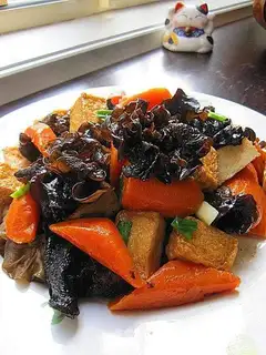 Braised tofu fish cake with fungus and radish