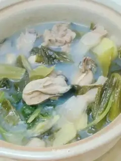 Baked oysters with pickled cabbage