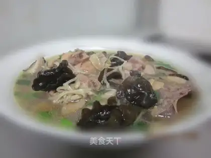 Chicken nuggets with mushroom shavings