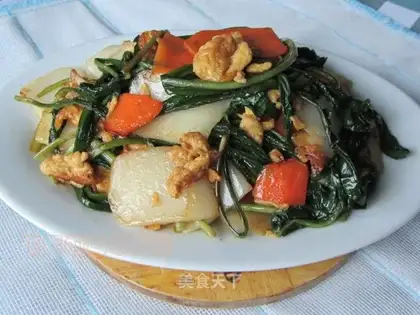 Fried rice cake with dandelion eggs