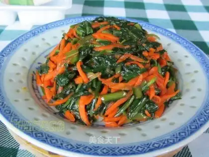 Dandelions mixed with shredded carrots