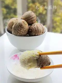 hairy taro dipped in sugar