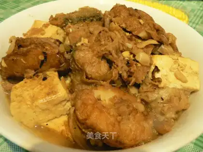 Stewed tofu with headless fish