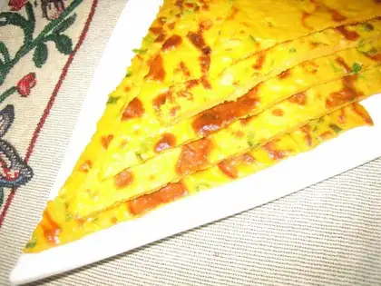 egg cake with carrot juice and chive