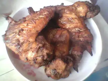 Fried chicken wings with tomato sauce