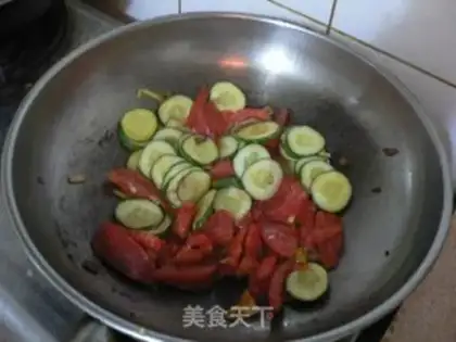 Make Scrambled eggs with tomato and cucumber step 5