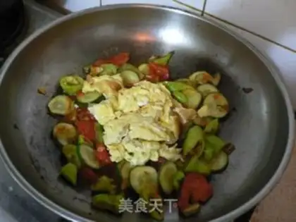 Make Scrambled eggs with tomato and cucumber step 7