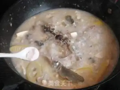 Make Spring bamboo shoots, tofu and perch head soup step 7