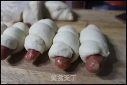 Make Milk sausage steamed bun roll step 7